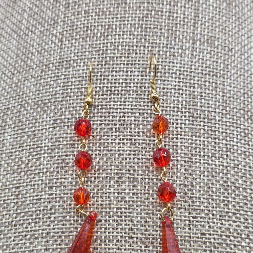 Red/orange bead earrings‎ with gold accents and dangling beads